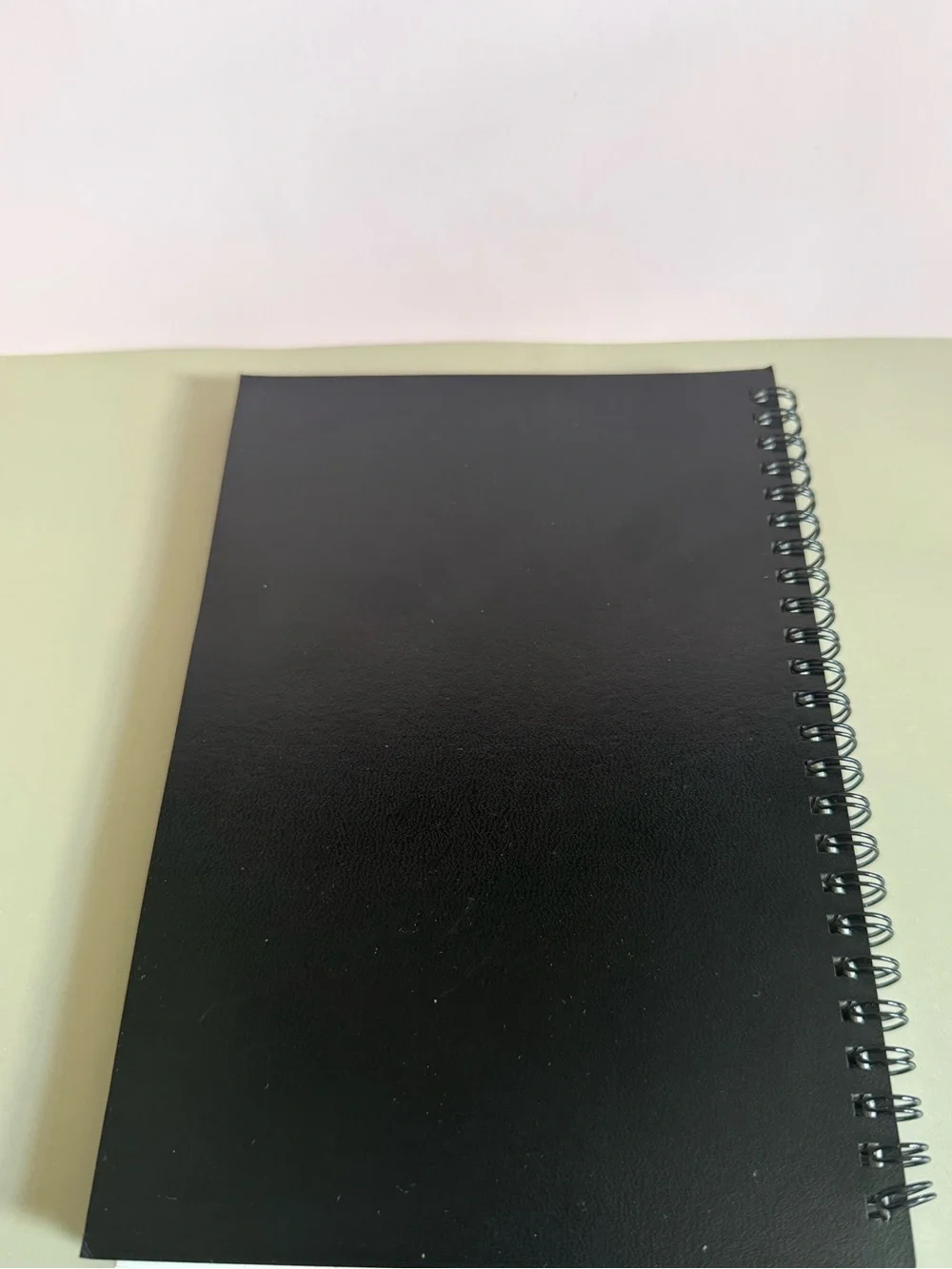 Cartier Black Notebook with Gold Logo